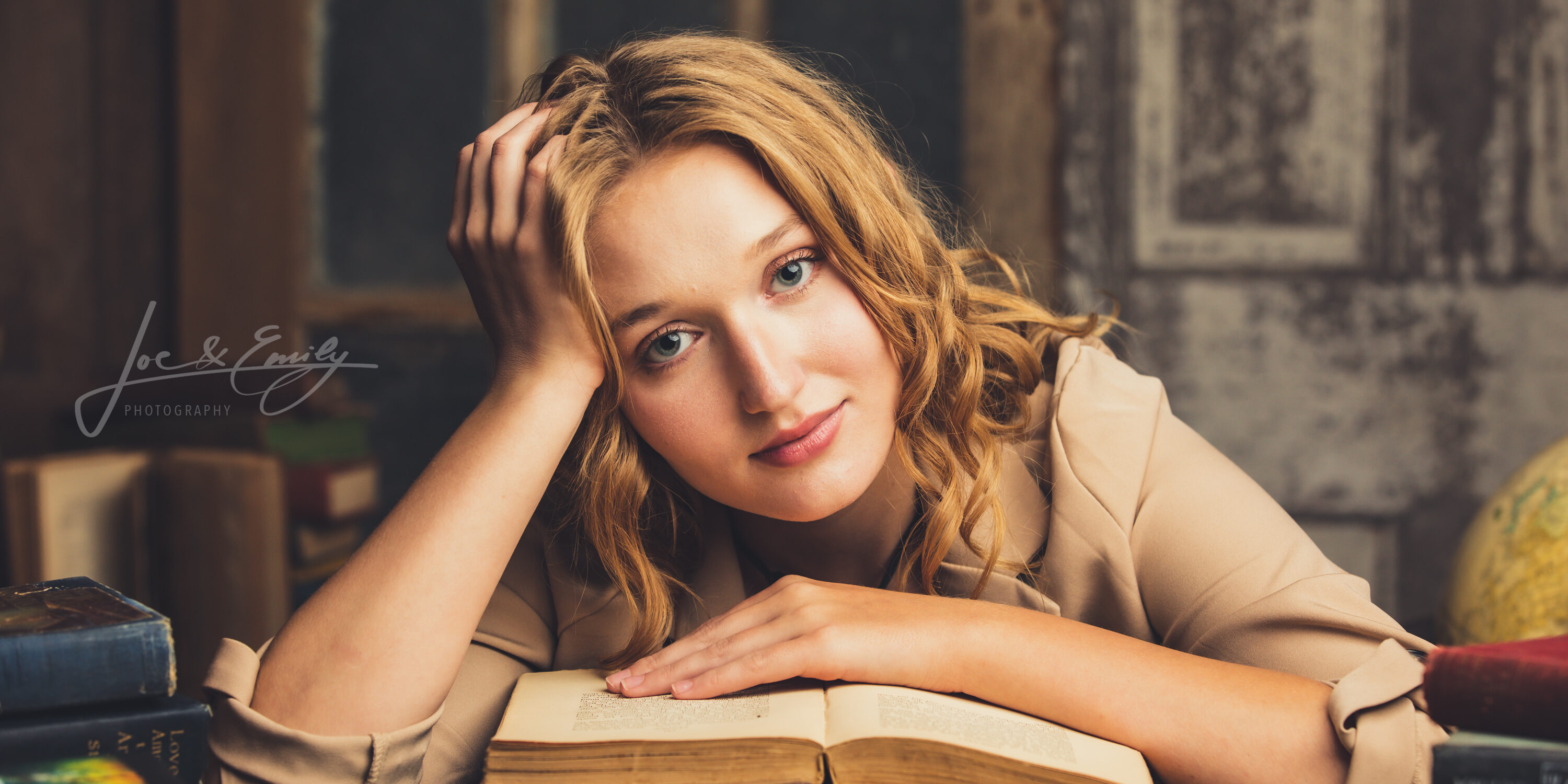 Girl laying on books