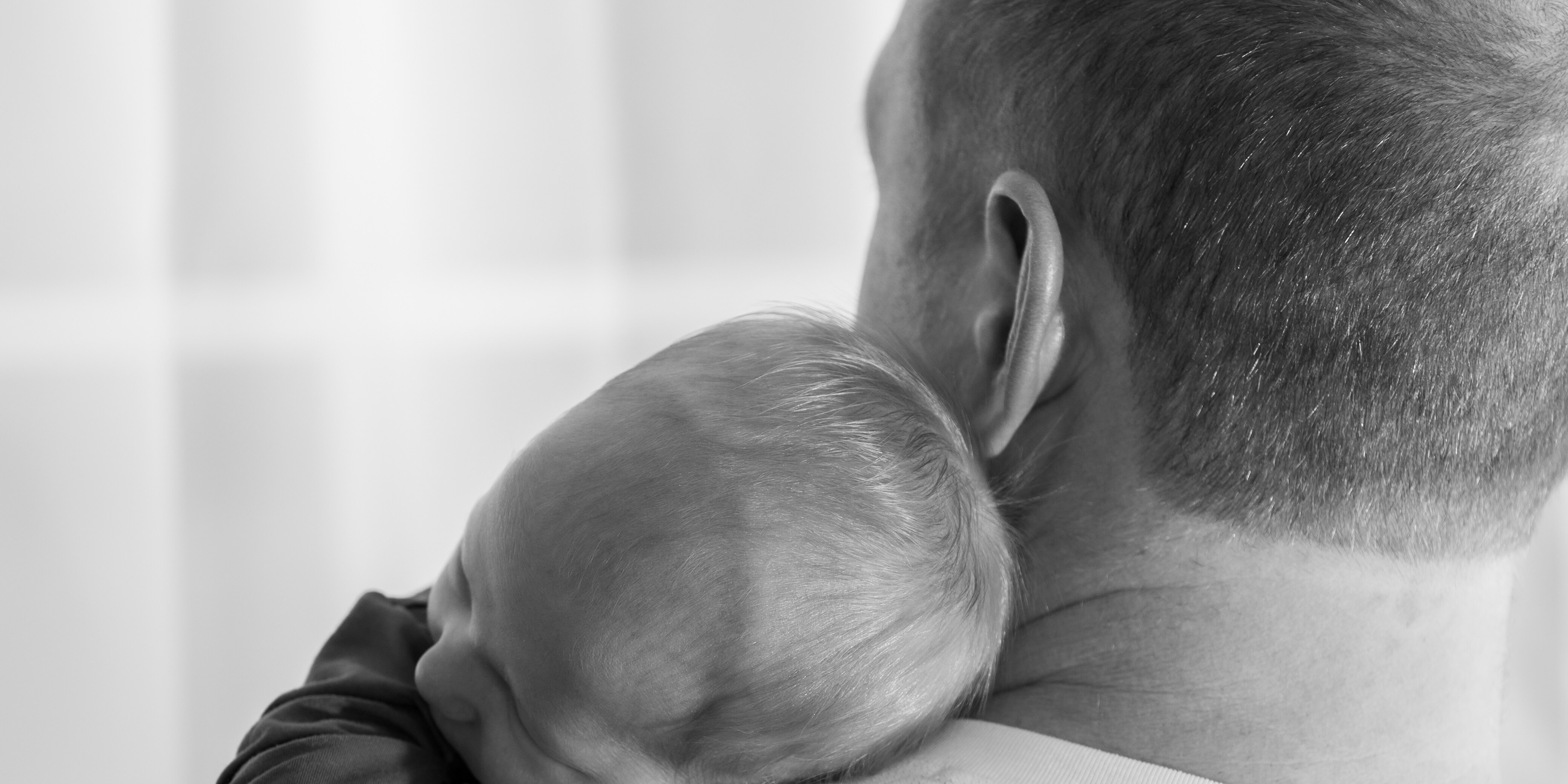 Dad holding baby