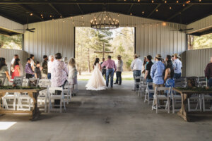 Bride and her dad walking to the alter