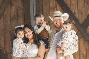 Bride and groom with ring bearer and flower girls.