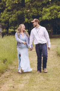 Couple walking in a field