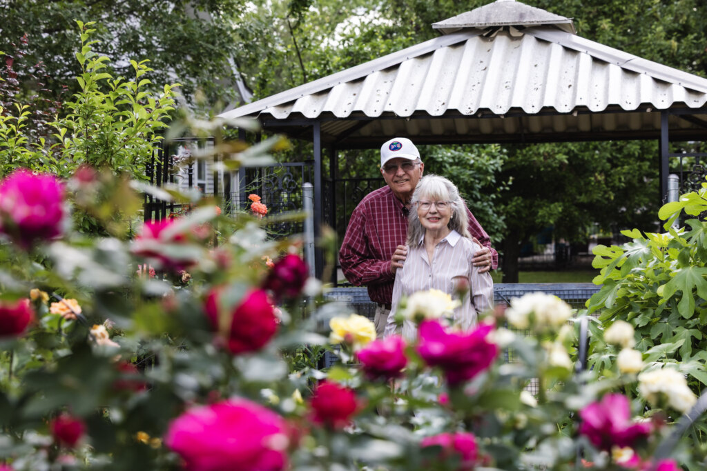 Couple standing in a garden