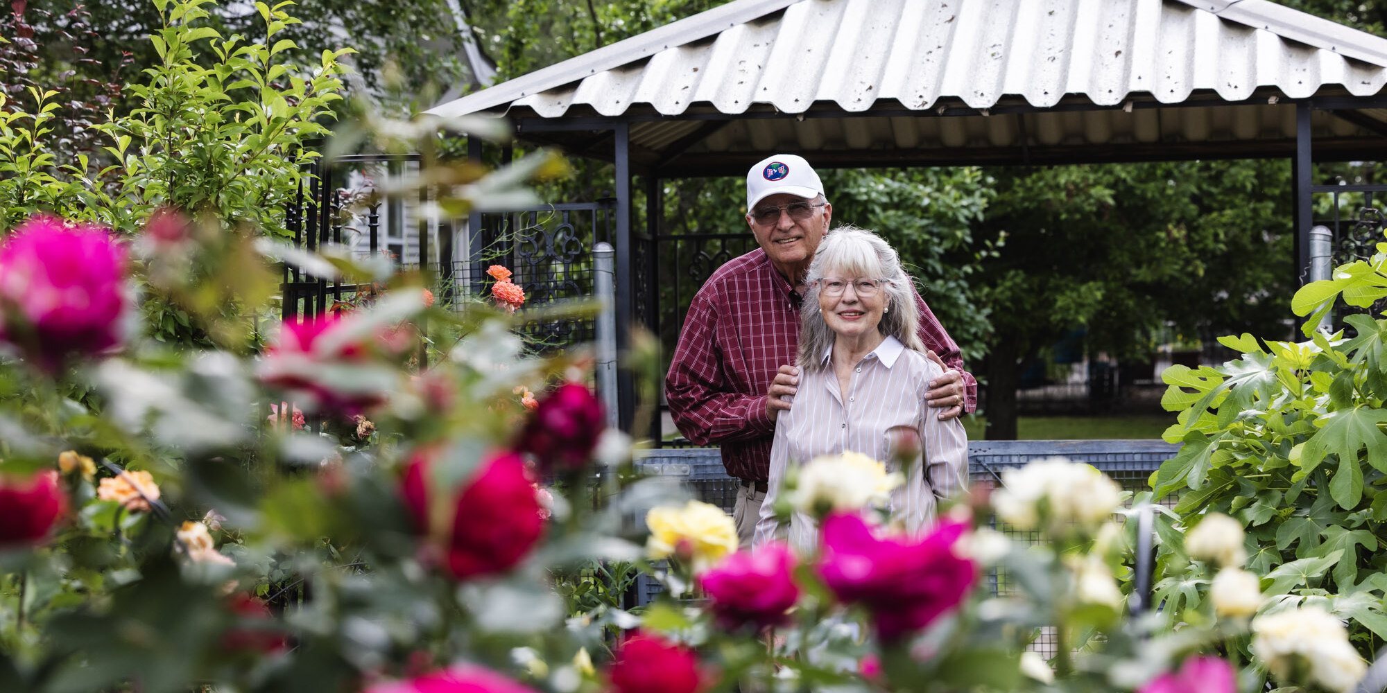 Couple standing in a garden