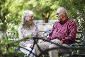Couple sitting in a garden