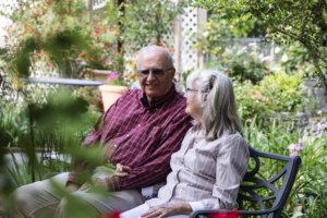 Couple sitting in a garden