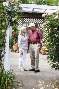 Couple standing in a garden