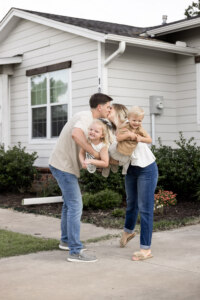 Family outside of house